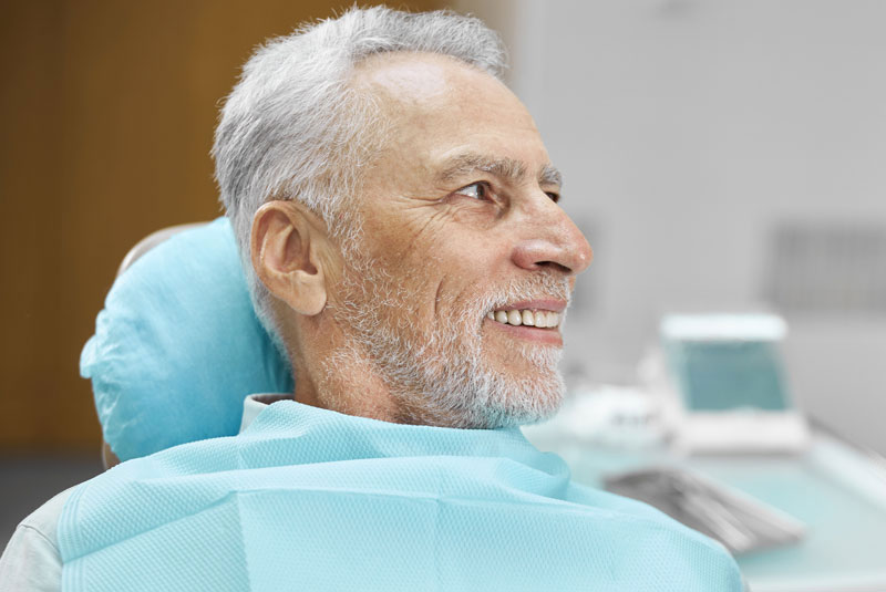 mature male during consultation for dental implants